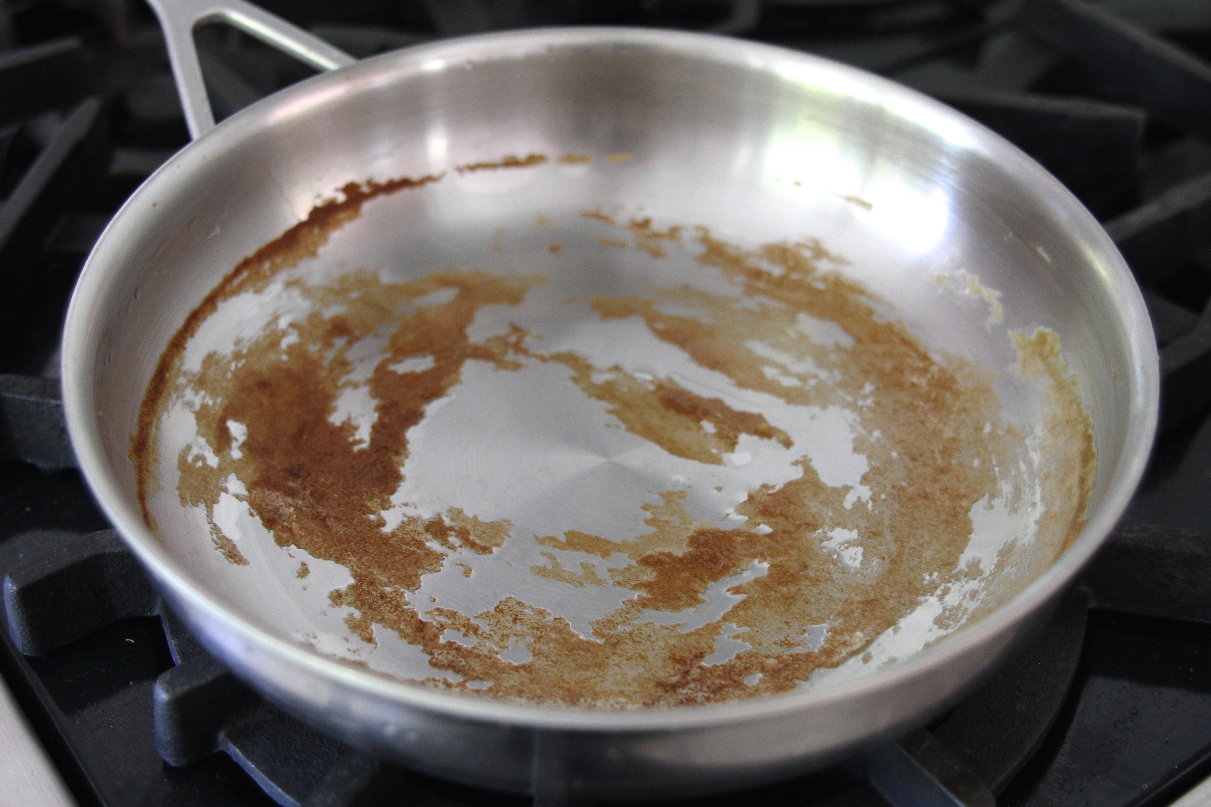 How To Easily Remove Burned Egg From A Stainless Pan simply organized