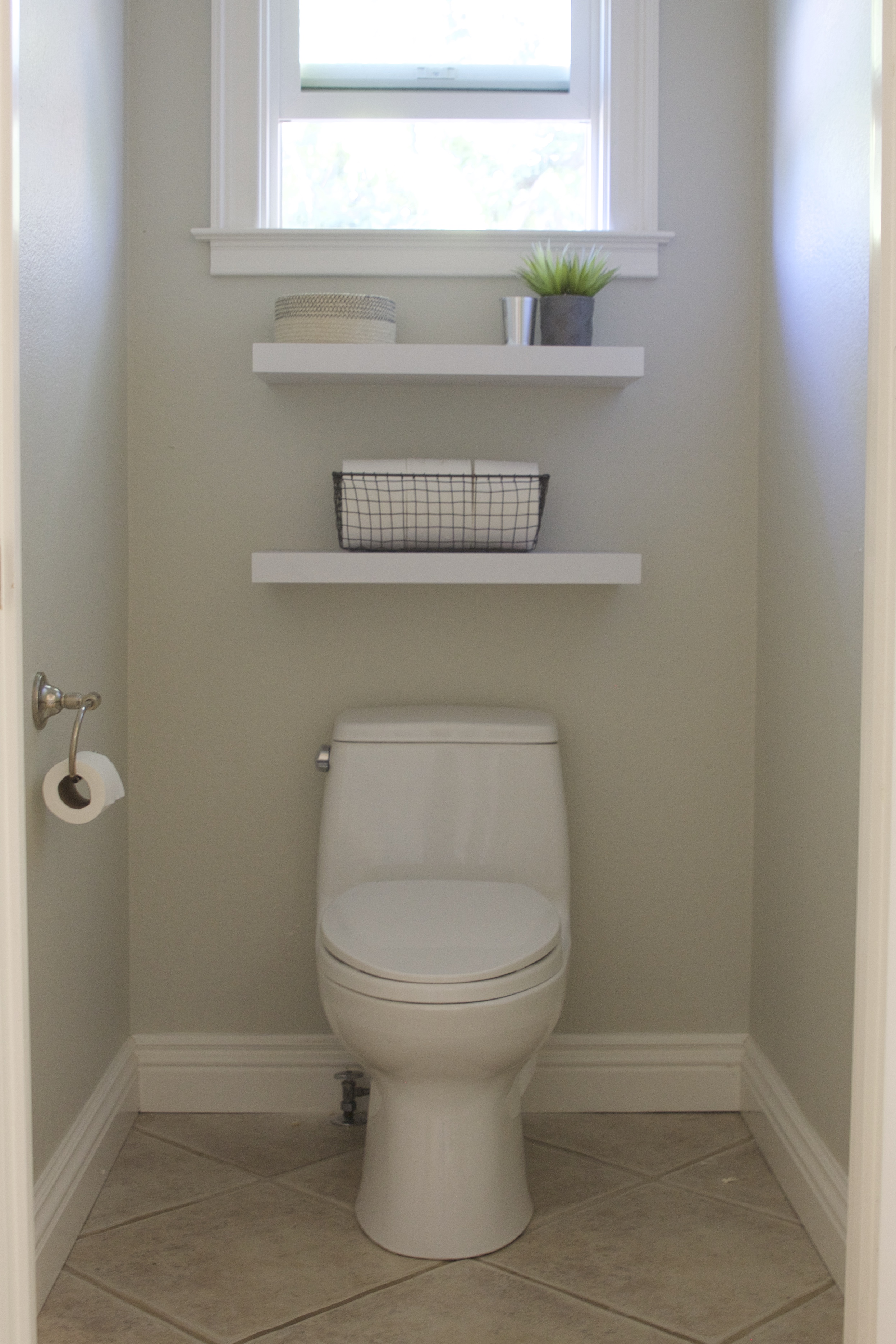 Simple DIY Floating Shelves in the Bathroom simply organized