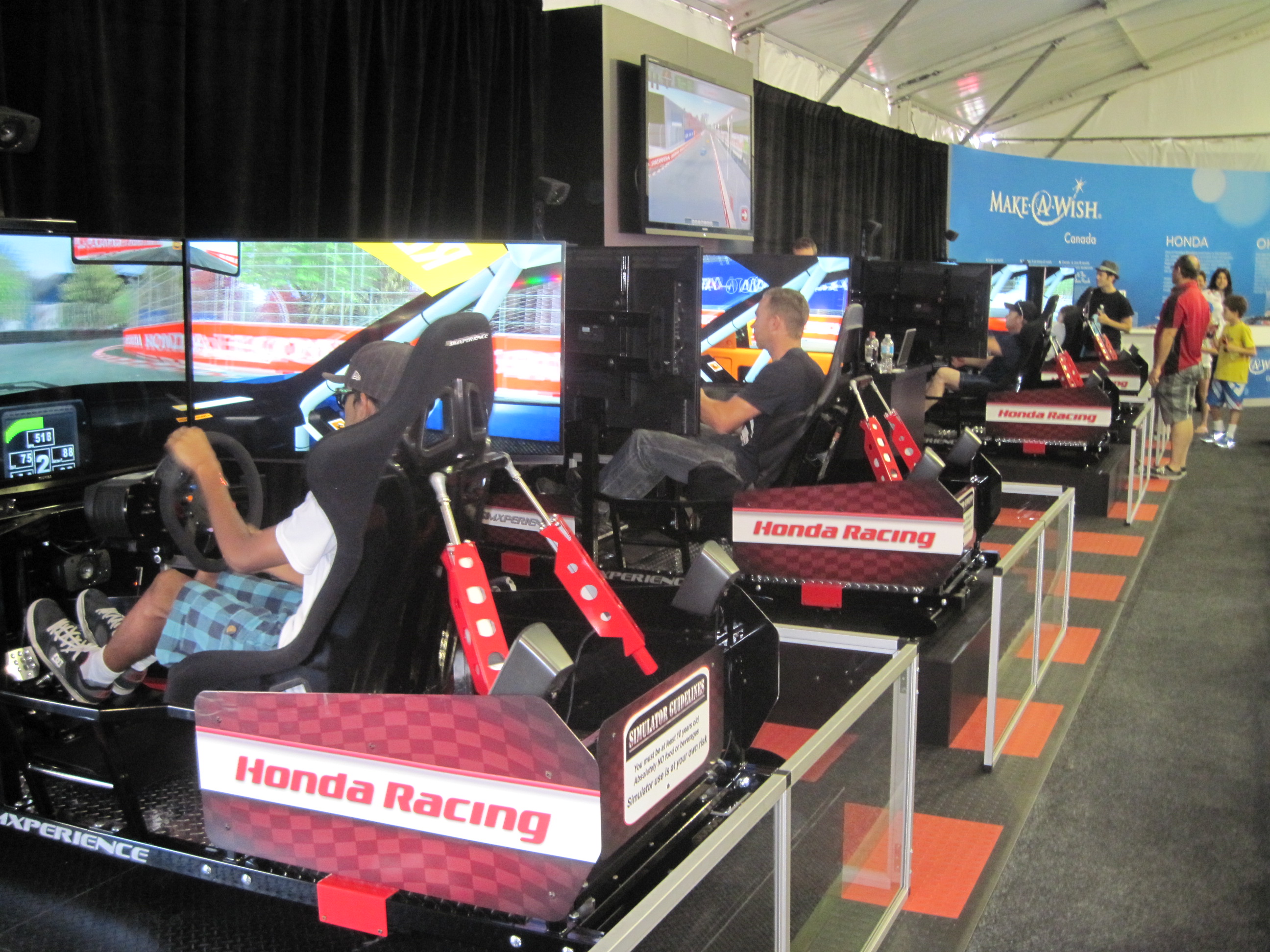 SimXperience Racing Simulators Entertain Race Fans and Drivers at Honda