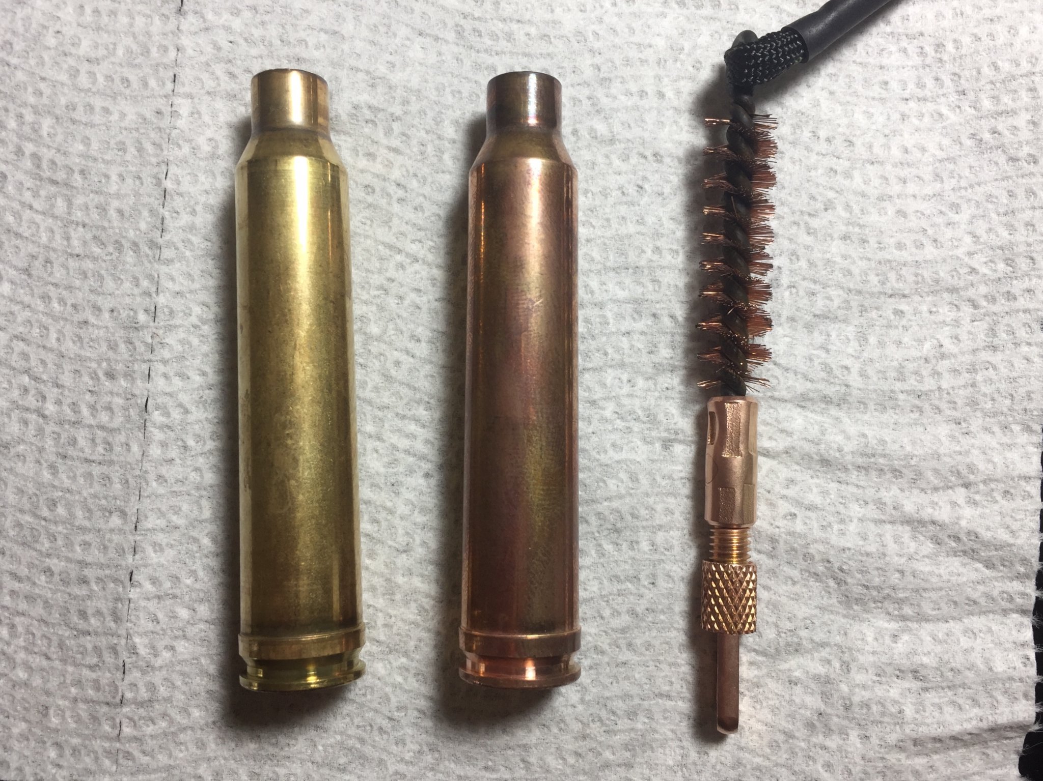 brass turned pink/red after cleaning next to a bore brush Sniper's