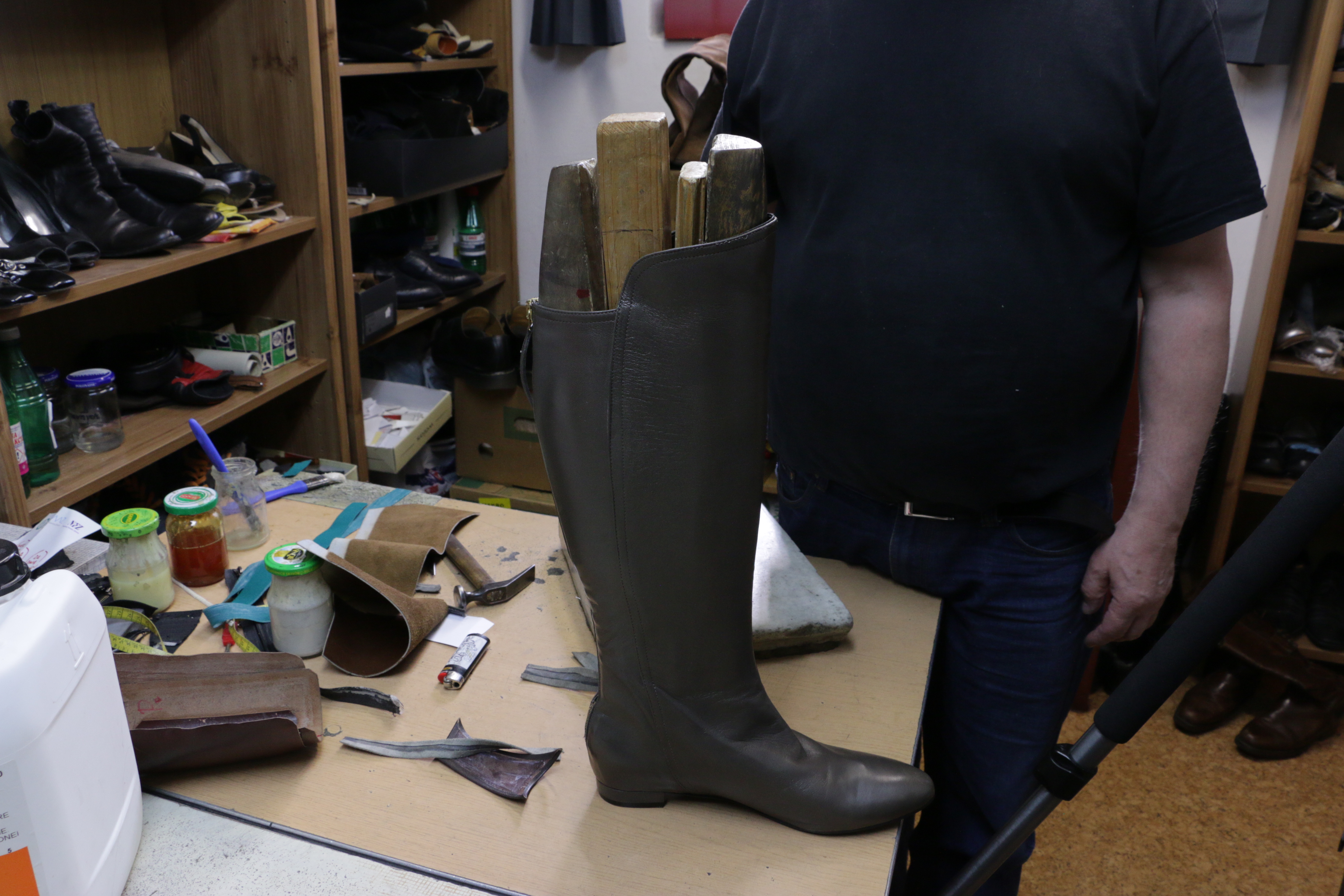 Shoemaker specializing in shoe uppers stretching the shoe upper