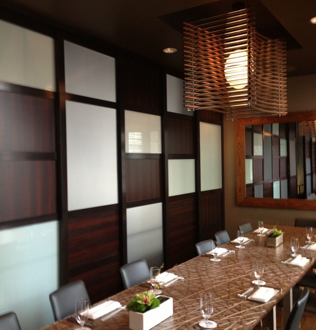 Elevate Your Restaurant's Ambiance with Glass Room Dividers Space Plus By The Sliding Door Company