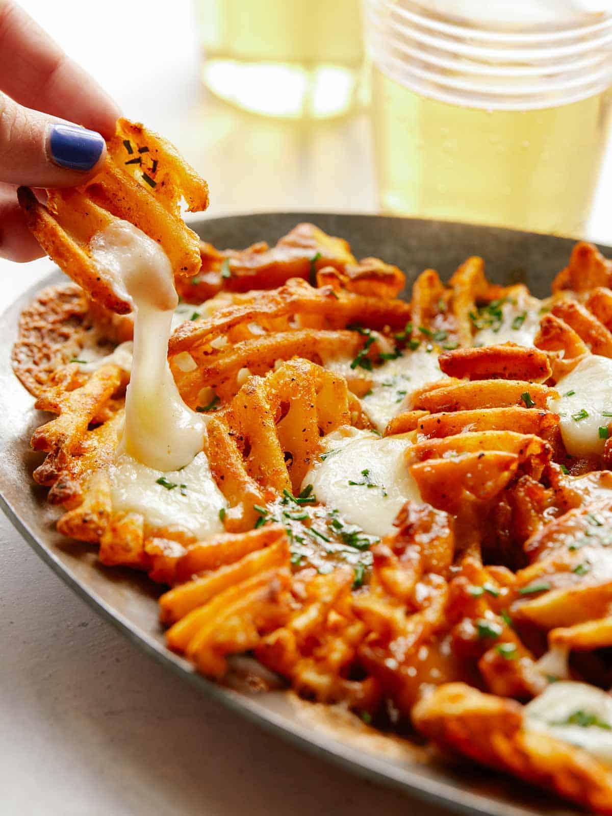 Poutine with Waffle Fries Spoon Fork Bacon