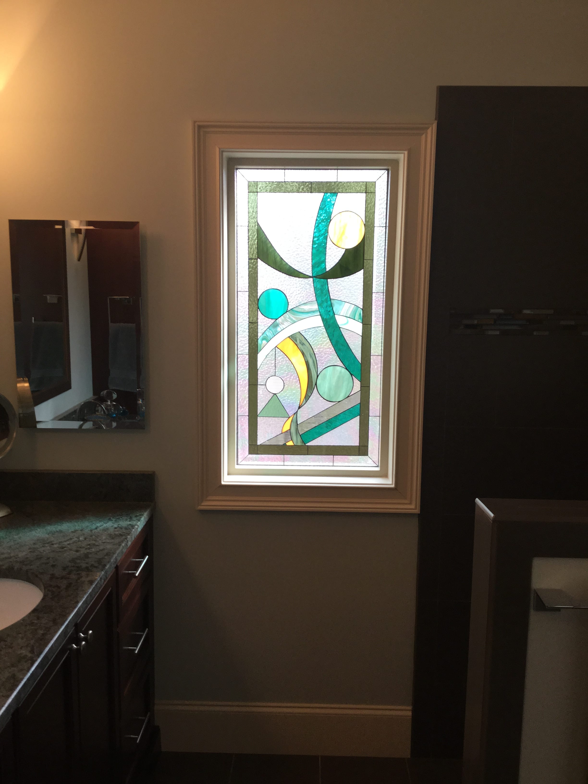 Abstract Geometric Stained Glass Window Installed In Kitchen