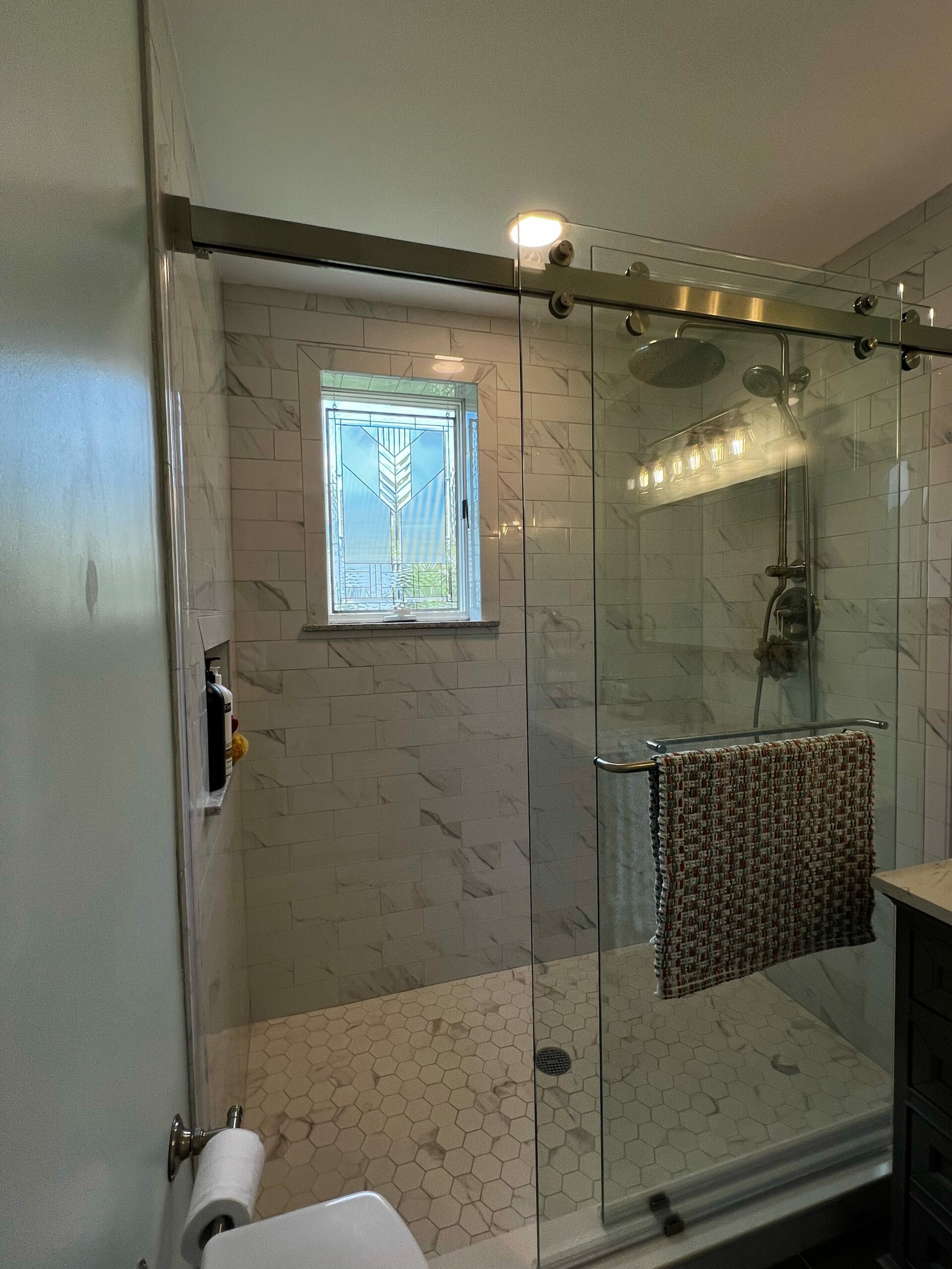 Clear and Beveled Shower Window Installed