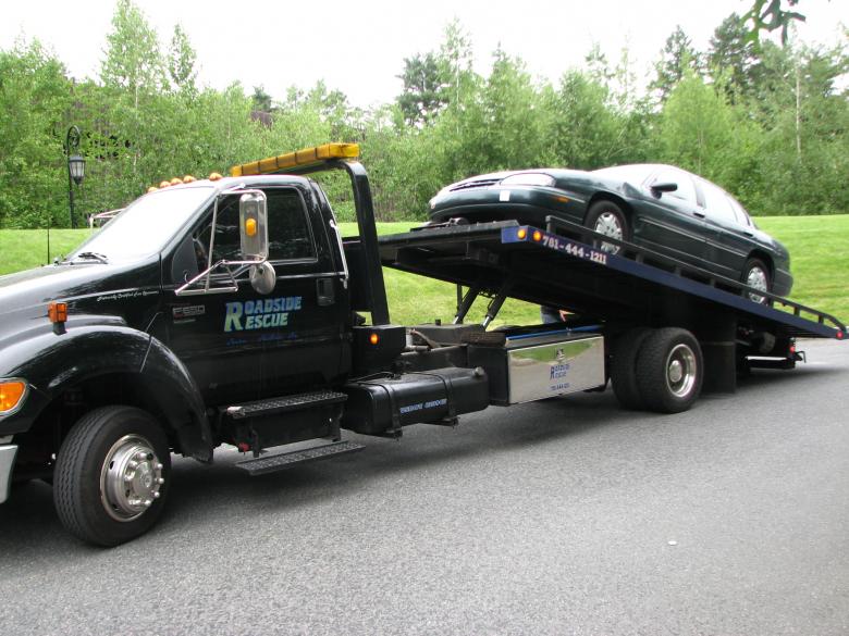 Car on Tow Truck Free Stock Photo by Katharine Sparrow on