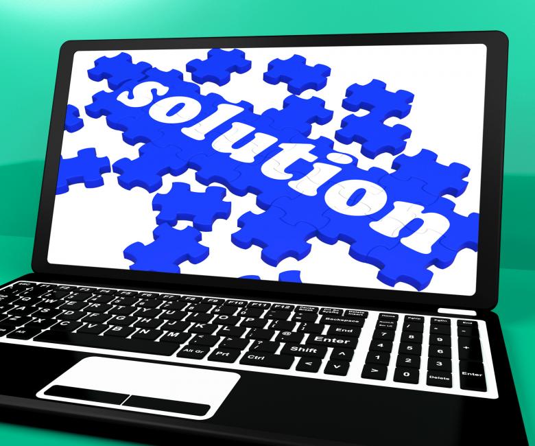 Solution Puzzle On Notebook Showing Computer Applications Free Stock