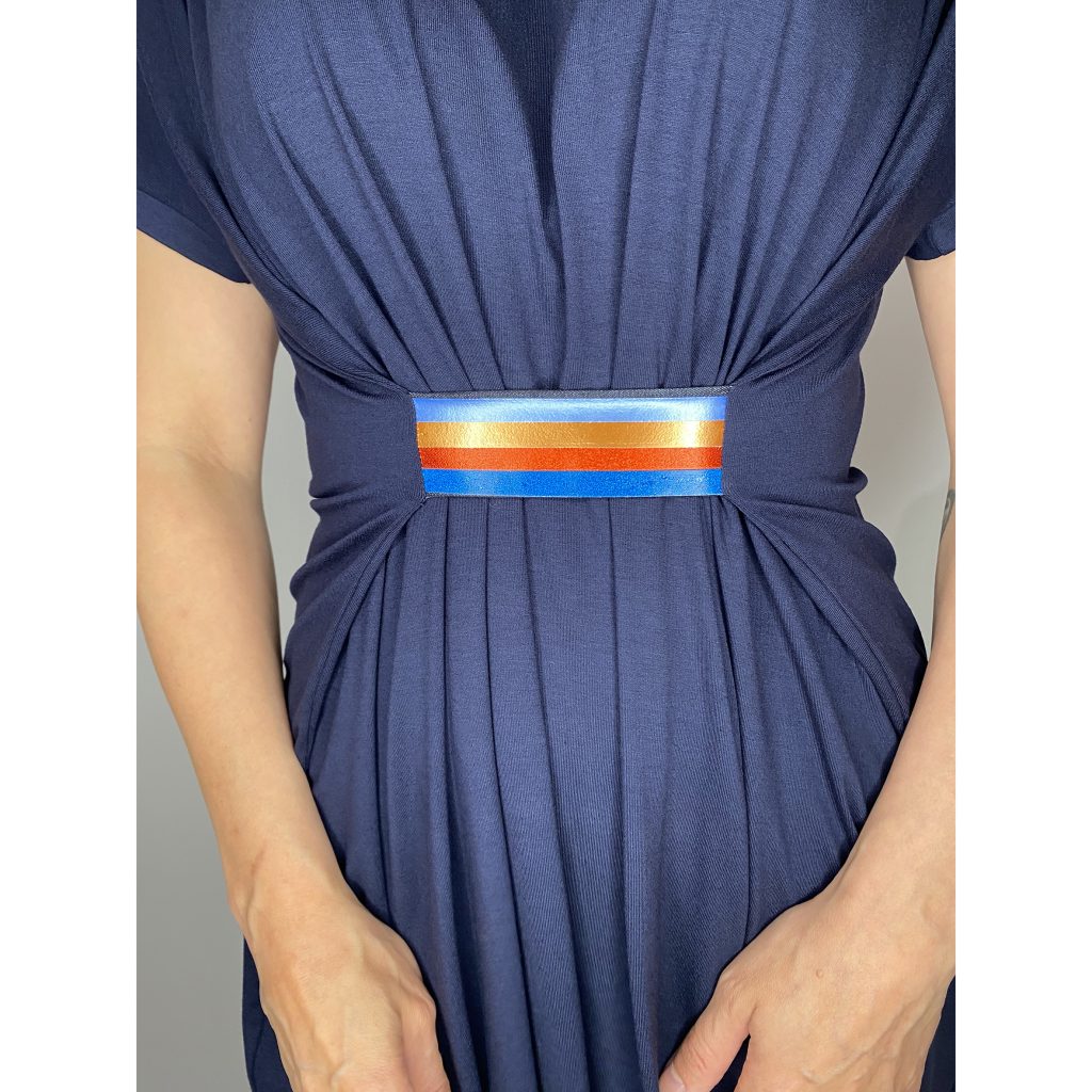 Flowy navy blue dress with sewn in multi coloured belt