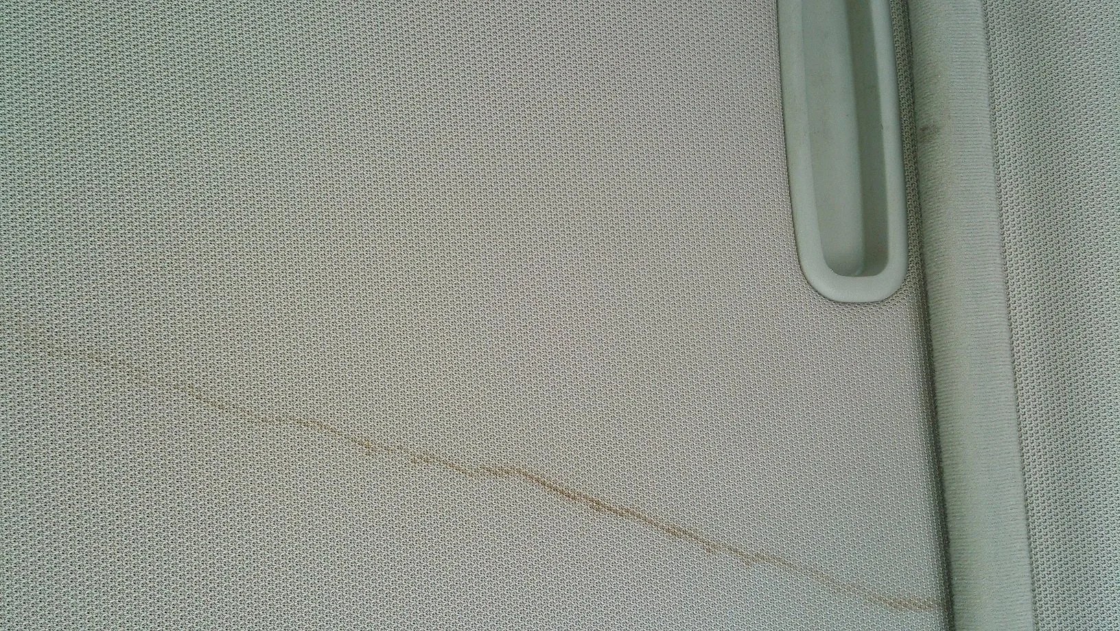 Gen 3 How to clean a stain in the beige roof liner and sunroof shade