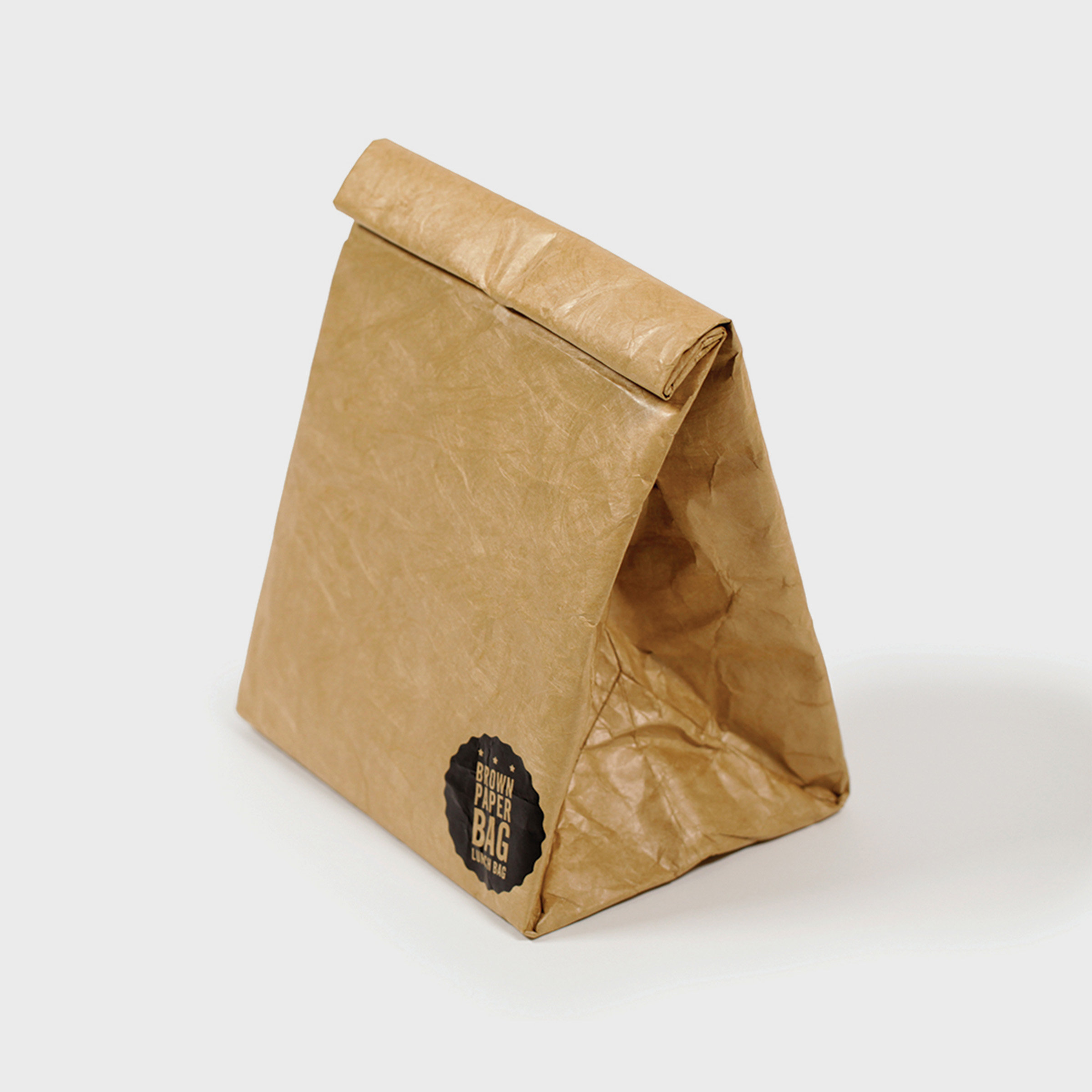 Brown Paper Bag Insulated lunch bag with fastening.