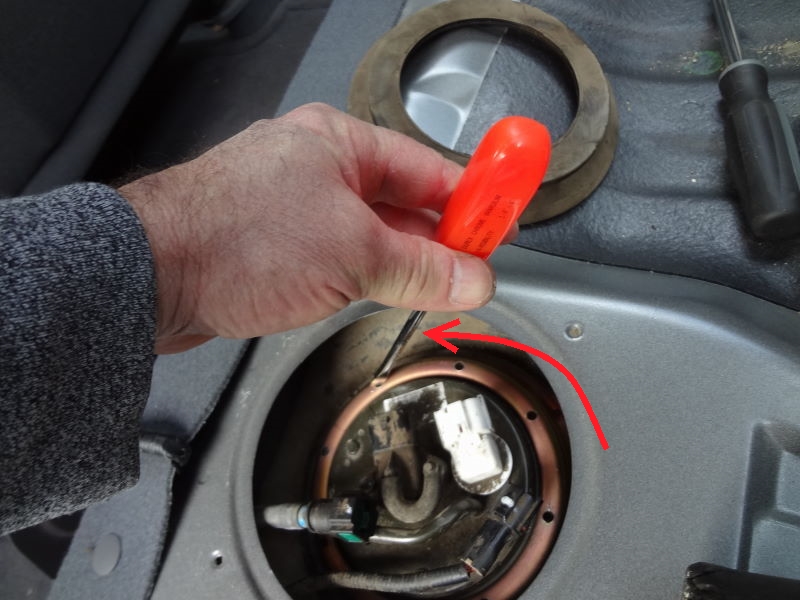 How to change a fuel filter in a 2004 kia rio Blue