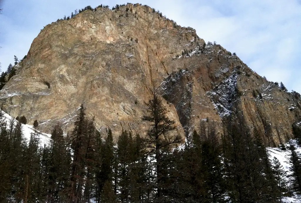 At the base of the large cliff, near Mill Creek Road, Paradise Valley