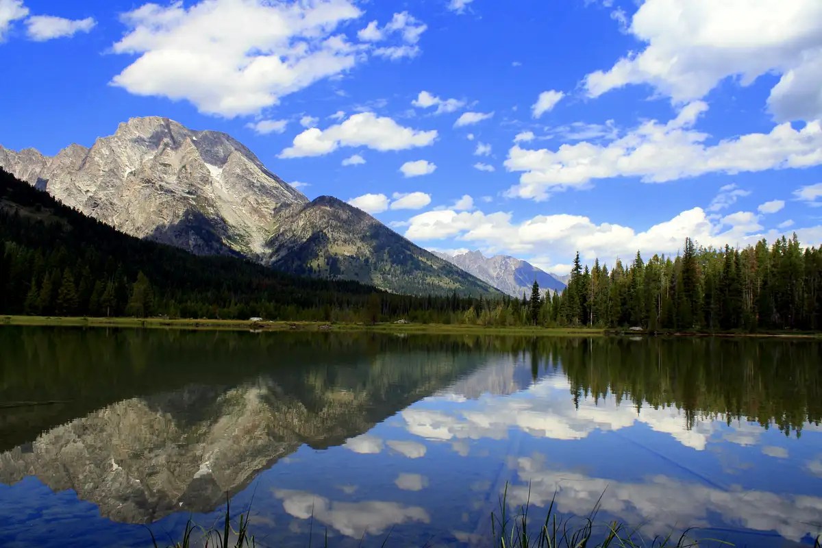 A reflection of Mount Moran off of String Lake Photos, Diagrams & Topos SummitPost