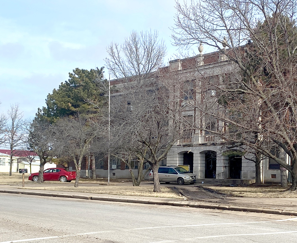 Owner of old Wellington Junior High building has been cited for parking