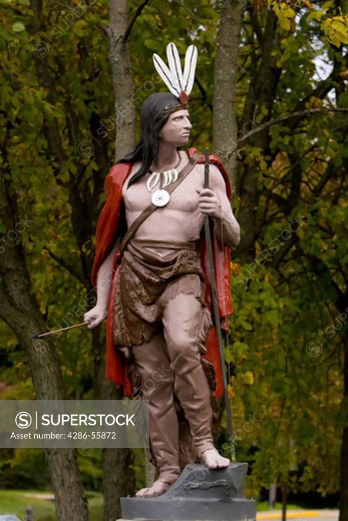 MOUNT KISCO, NEW YORK, USA Painted metal statue of native american