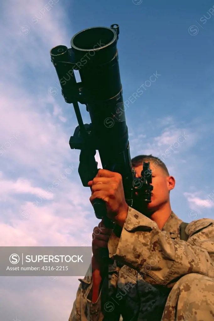 A Marine Assaultman Aims a Rocket Launcher SuperStock