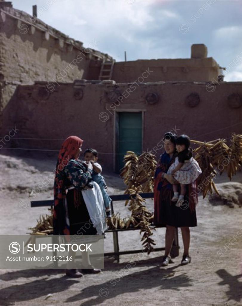 Zuni Indians and Native Pueblo Dwelling New Mexico USA SuperStock