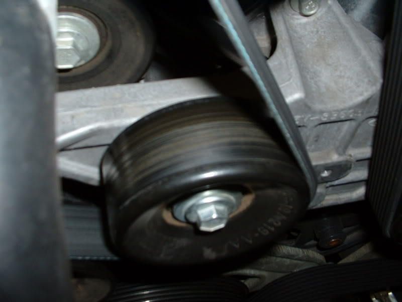 Uneven idler pulley wear