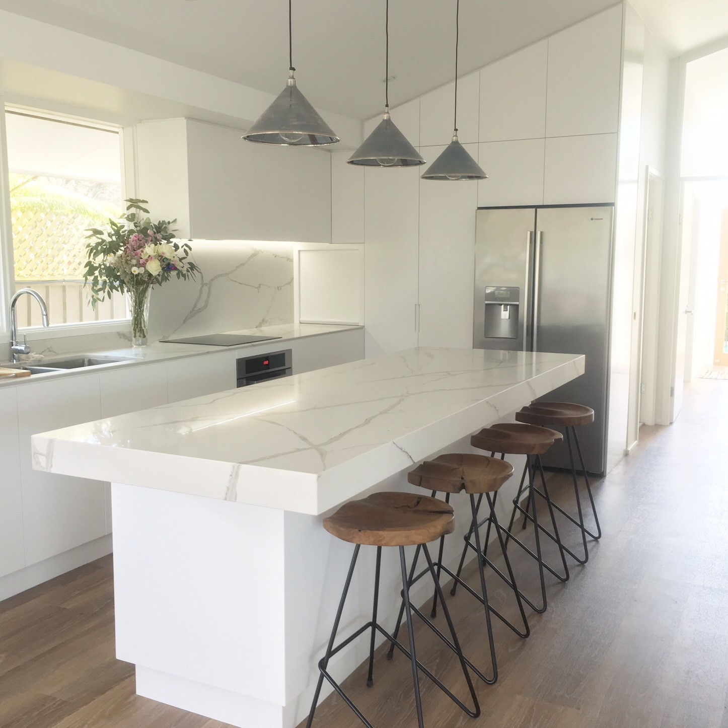 Polyurethane Kitchen with Stone Benchtops and Splashback Tasker Joinery