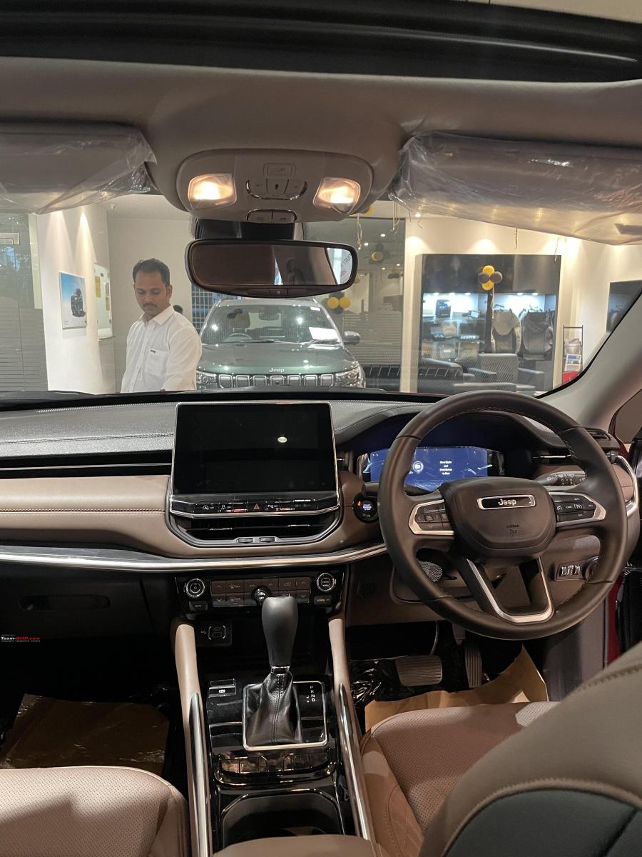 A Toyota Fortuner owner checks out the Jeep Meridian AboutAutoNews