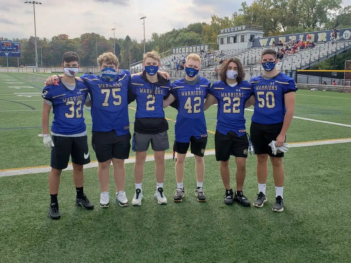 Schroeder Football Volunteering at Soccer Games Team Up 4 Community