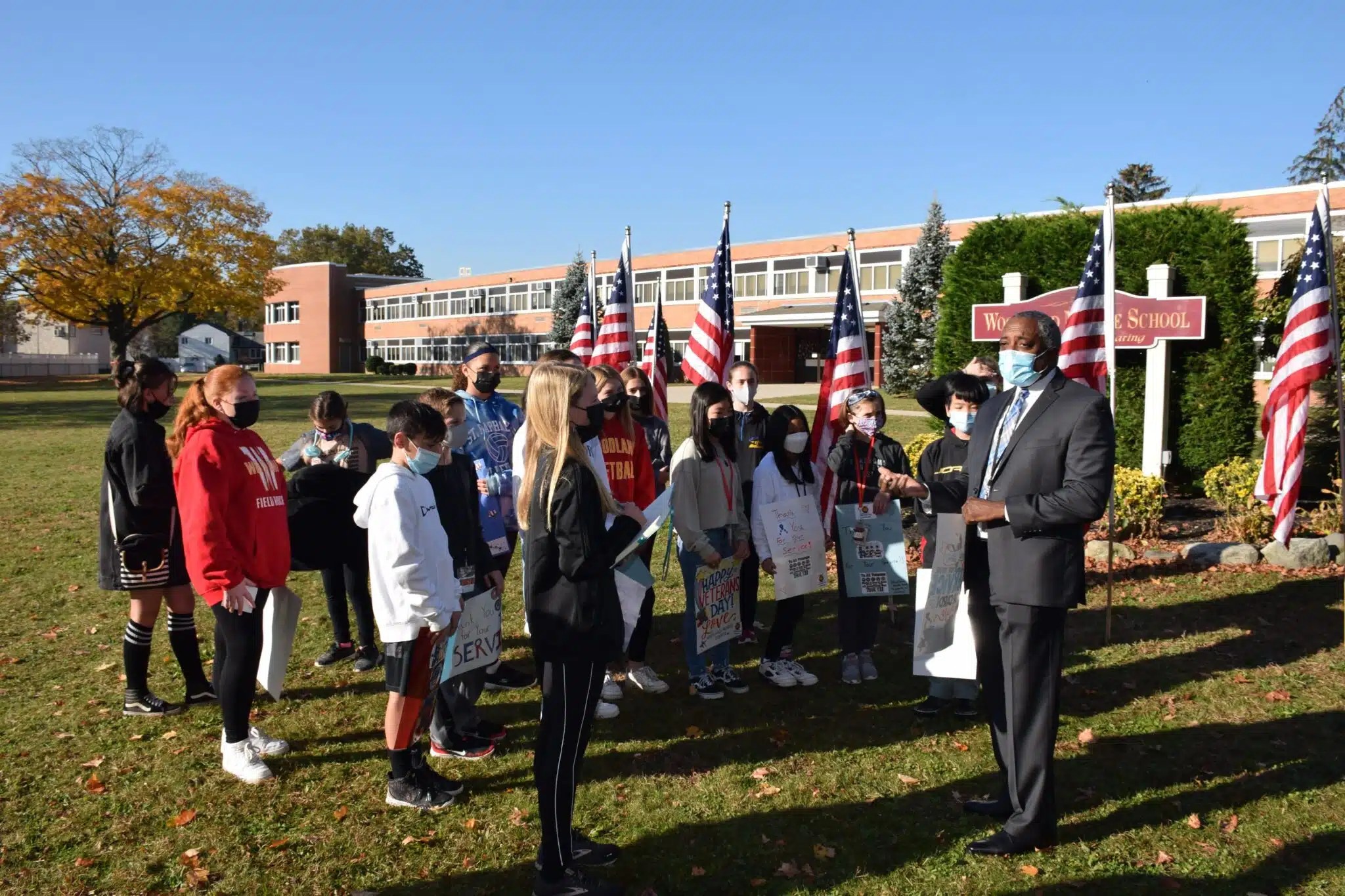 Honoring a local veteran at Woodland Middle School Team Up 4 Community