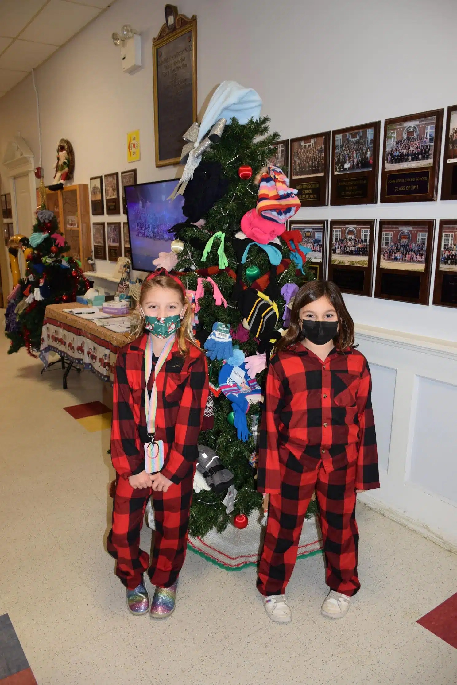 John Lewis Childs School displays Mitten Trees for those in need Team