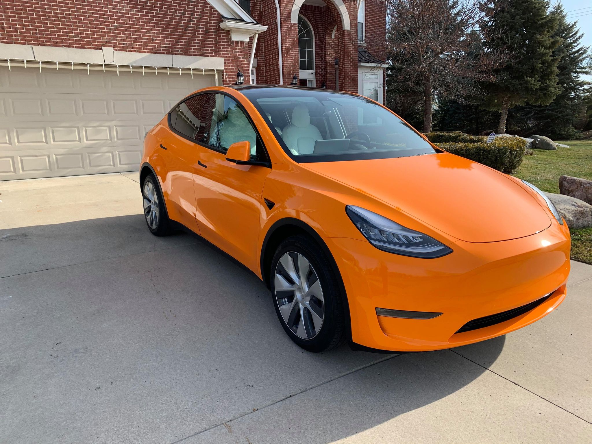 This orange wrapped Tesla Model Y is a sure headturner (gallery