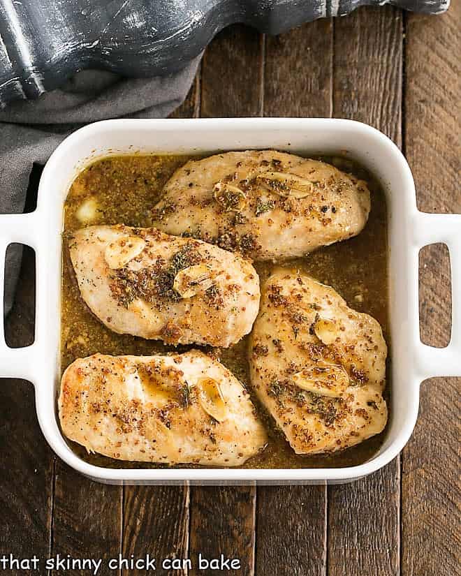 Maple Mustard Glazed Chicken - An easy, family friendly meal that is ready in about 45 minutes! Maple Mustard Chicken Breasts in a Baking Dish