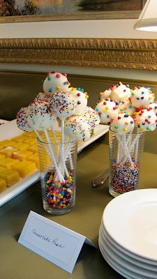White Chocolate Dipped Cheesecake Pops - an exquisite, bite-sized treat! White Chocolate Dipped Cheesecake Pops on the dessert buffet