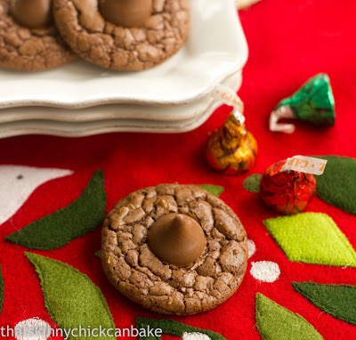 Double Chocolate Thumbprints - rich, tasty cookies for the chocoholic. Perfect for the holidays! Double Chocolate Thumbprints on a felt holiday stocking.