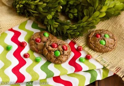 Holiday Truffle Cookies - Delicious chocolate cookies topped with festive M & M's for Christmas Holiday Truffle Cookies on a patterned napkin.