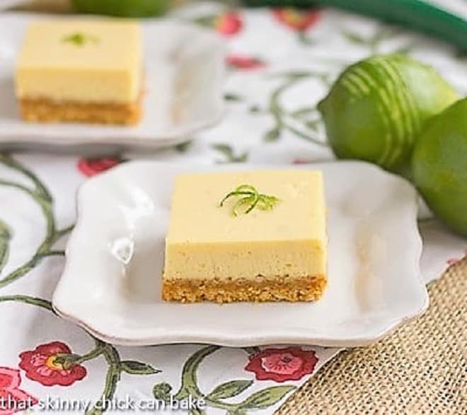Key Lime Bars with Coconut Crusts - Easy bar recipes that taste like key lime pie Key Lime Bars on square white plates