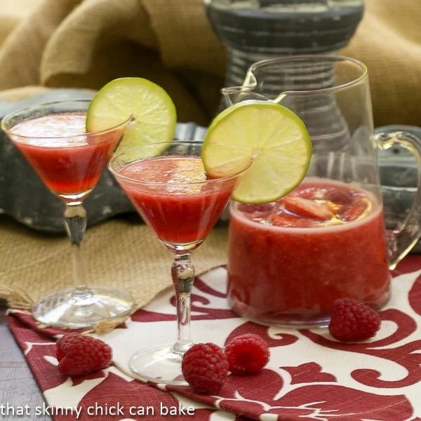 rozen Fresh Berry Daiquiris - easy, refreshing and a scrumptious warm weather cocktail Berry Daiquiris in martini glasses garnished with lime slices