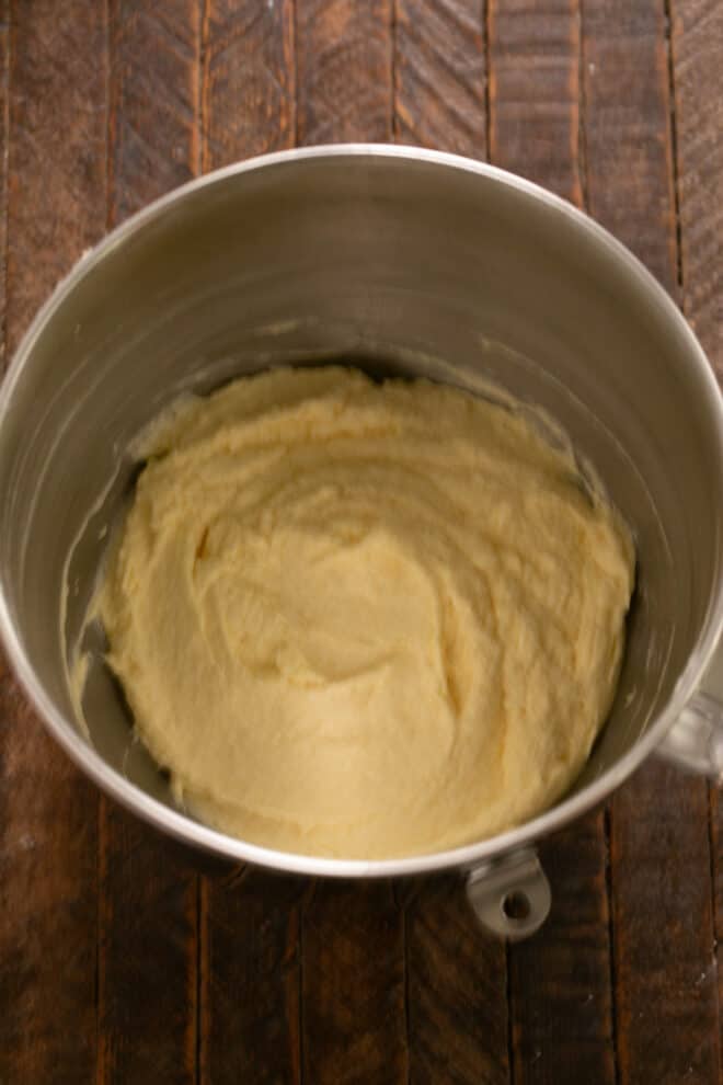 Butter and sugar beaten in a mixing bowl. Then add eggs.