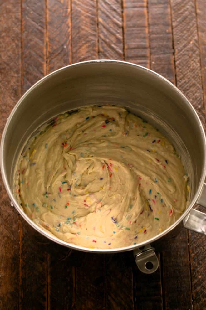 Fold in egg whites and sprinkles.