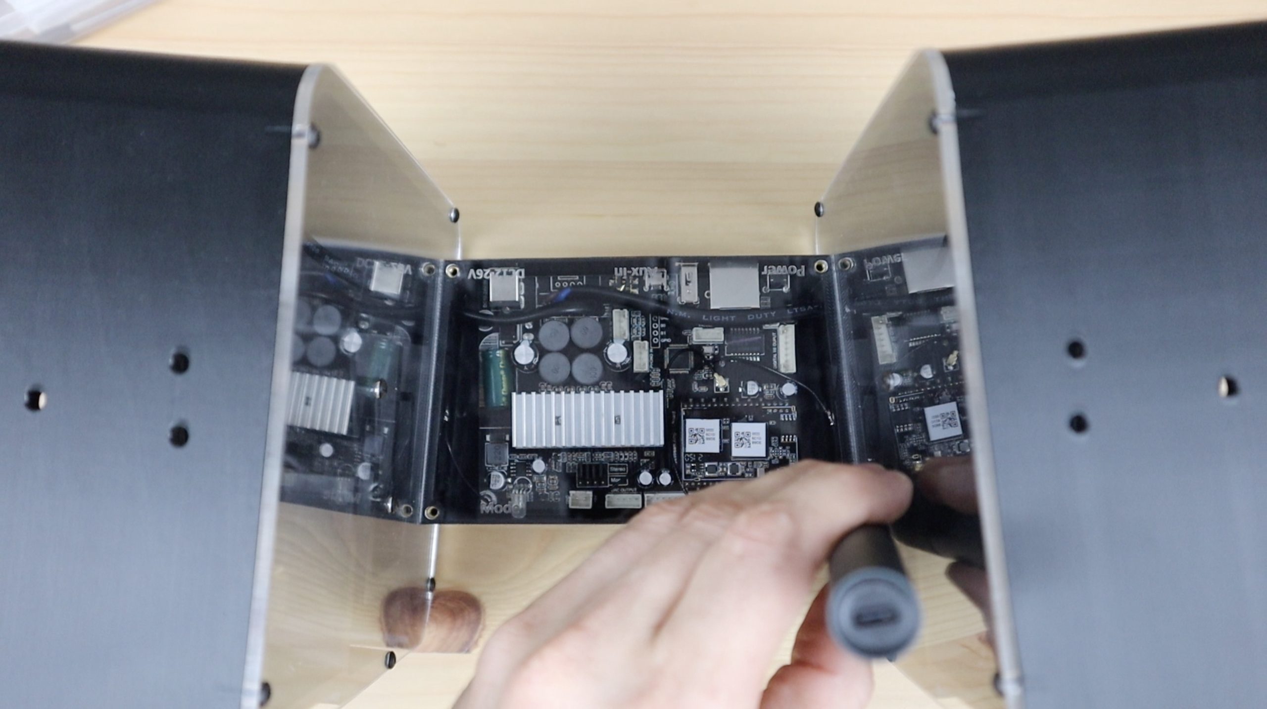 Screwing Acrylic Cover Into Place The DIY Life