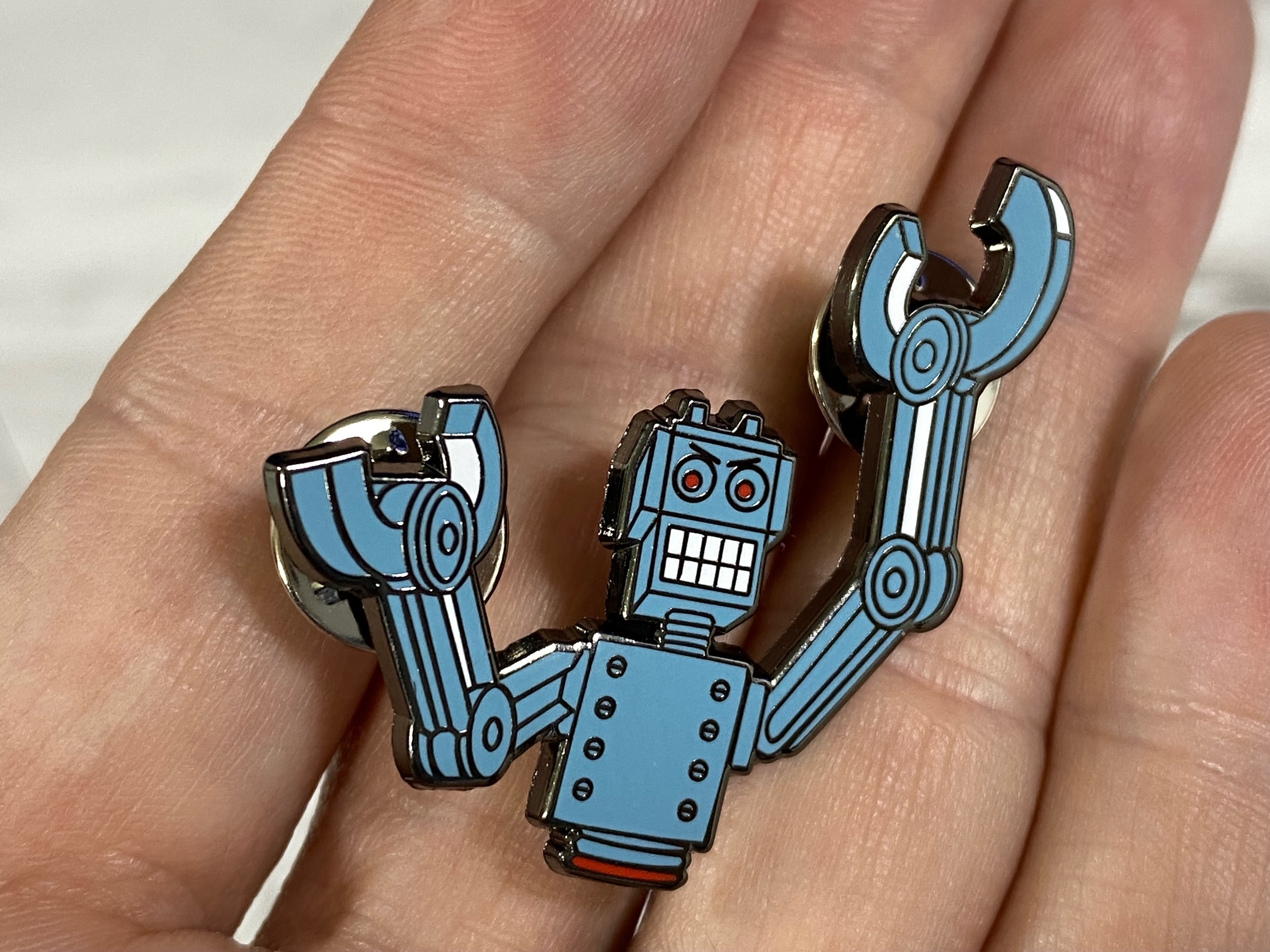 Petscii Robots Wearable Pin The 8Bit Guy