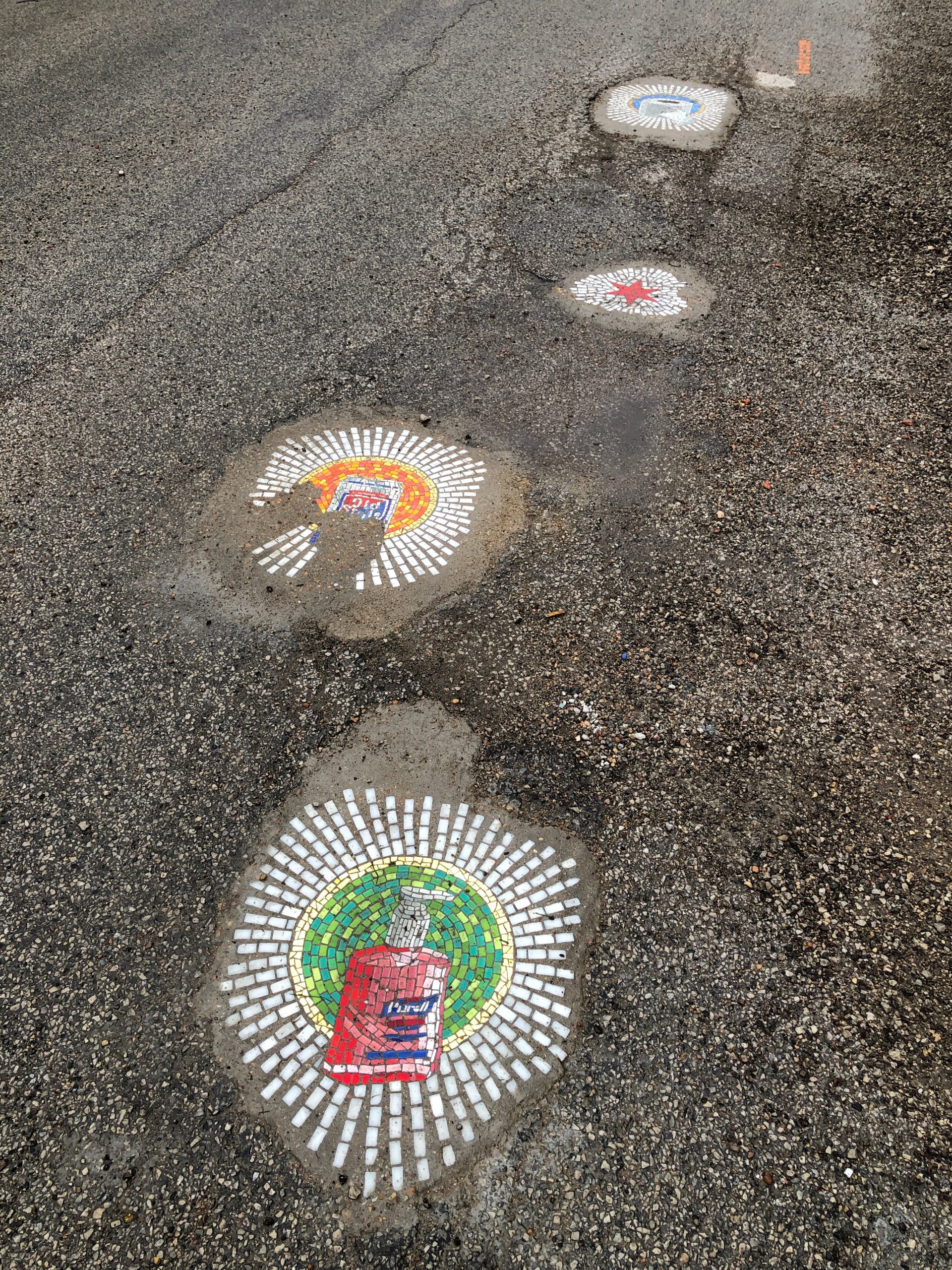 Chicago Artist Repairs Four Huge Potholes with Incredible Quarantine