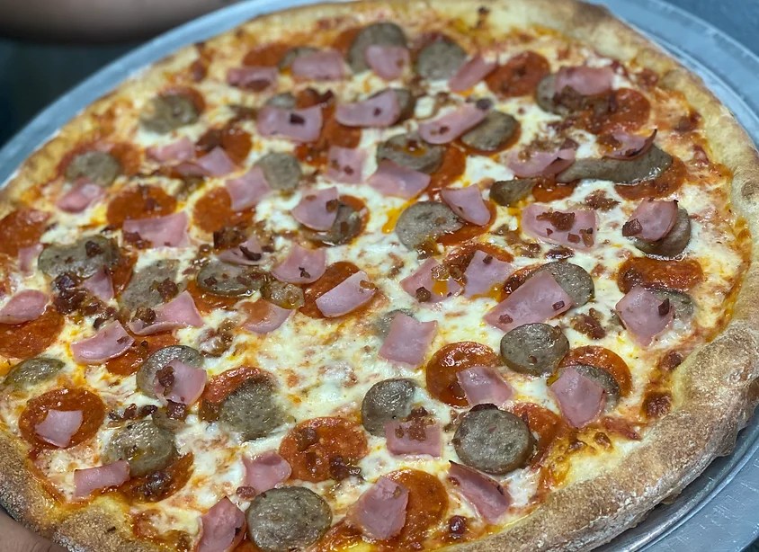 Rai’s Pizza starts serving up pies in Ashburn The Burn
