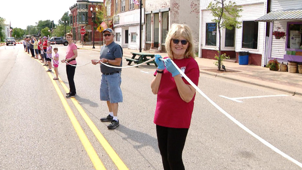 Son Beats Dad's World Record for Longest String Cheese The Dad