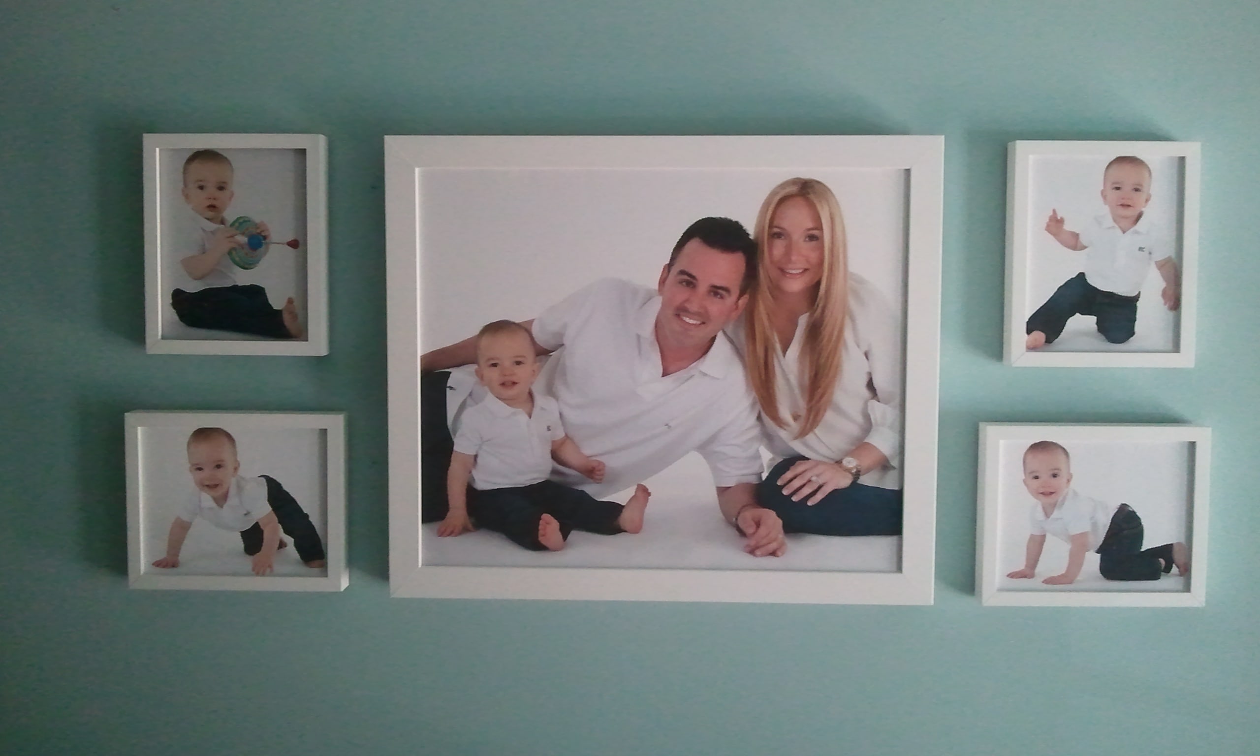 Family portrait wall grouping The Frame Studio Family portrait wall grouping The Frame Studio