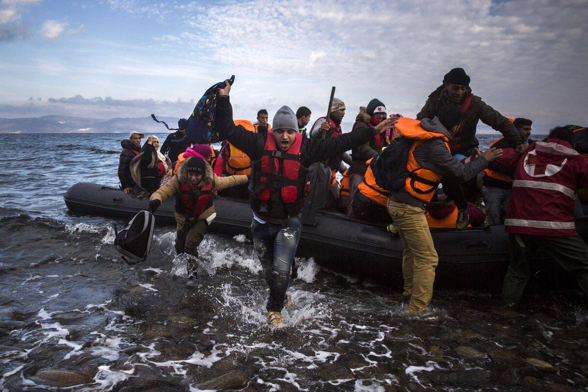 At least 12 drown as refugee smuggling boat sinks in Aegean Sea The