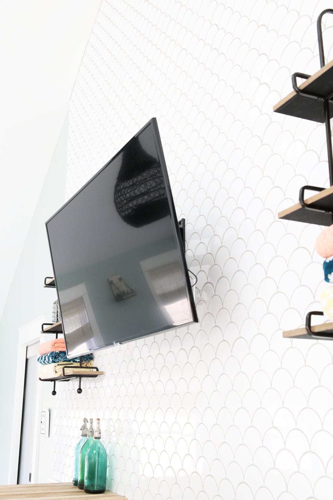 hang a tv on a tile wall a how to The Handmade Home