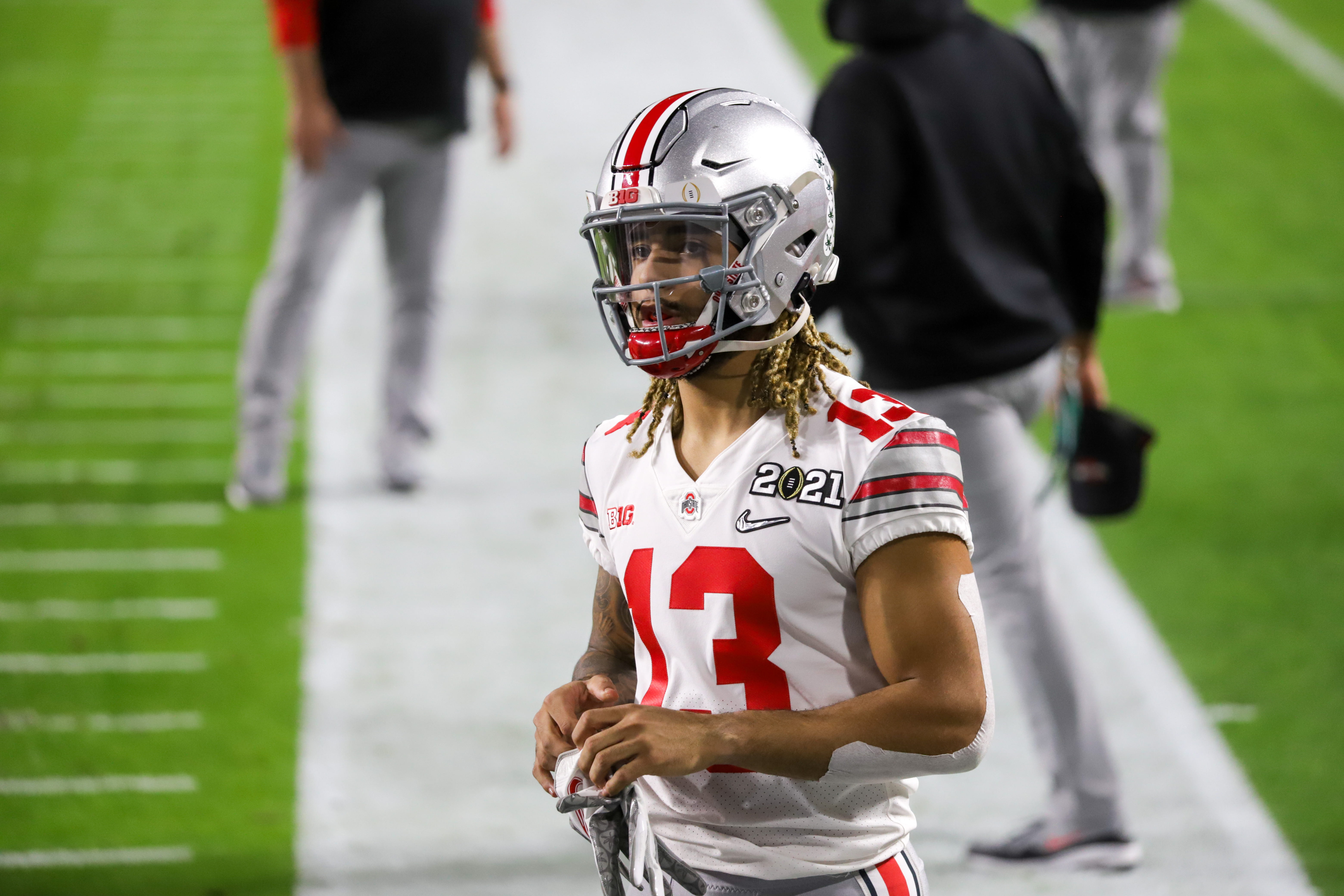 Football ‘I’m here to be a team player’ Gee Scott Jr. embracing move