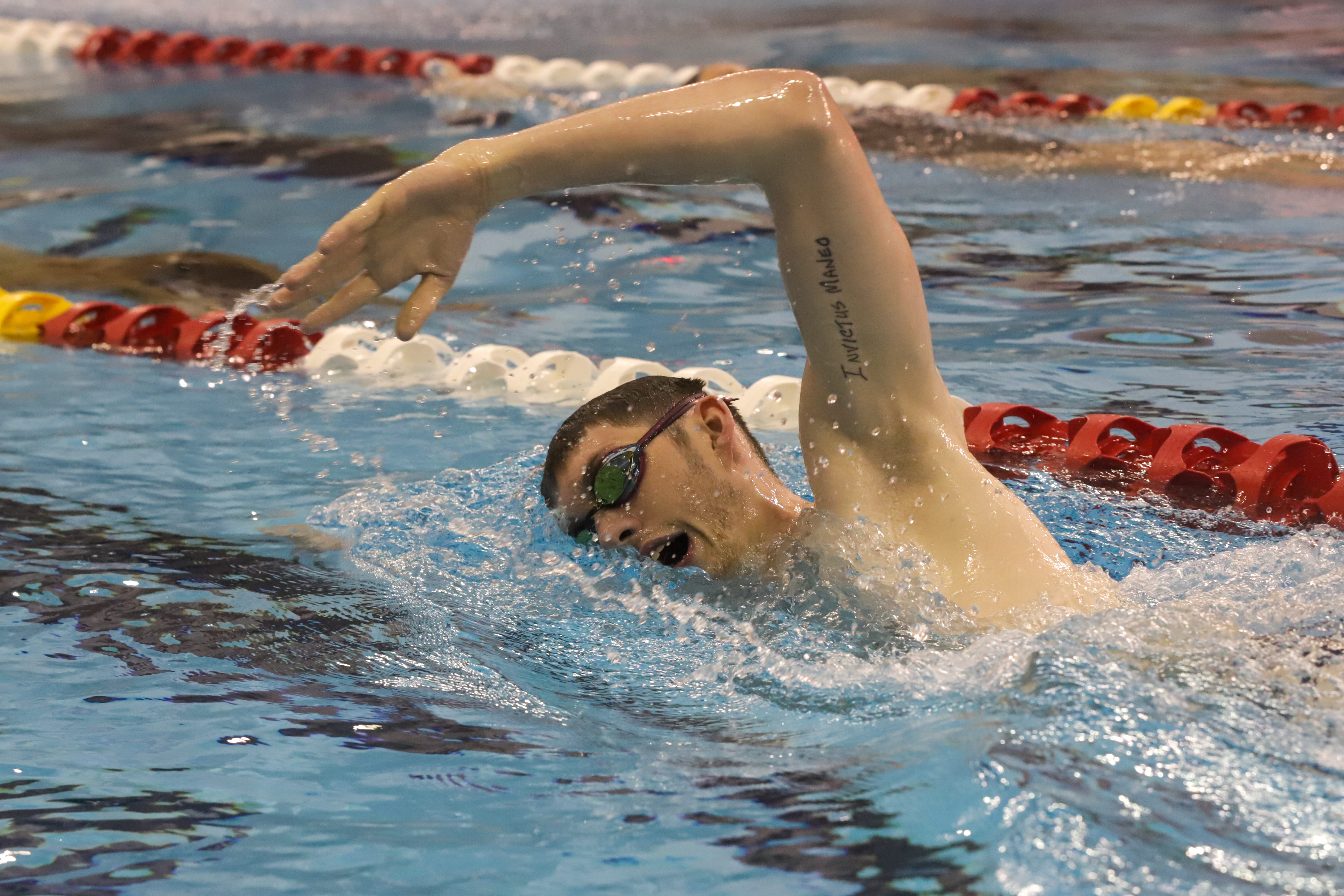 Swimming Hunter Armstrong helps Team USA in heats, earns gold medal in
