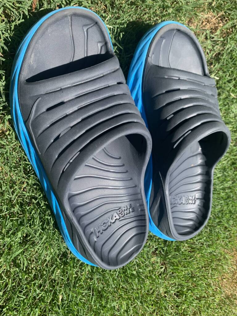 The Best Recovery Shoes for Runners Oofos vs. Hoka Slide vs. Kane