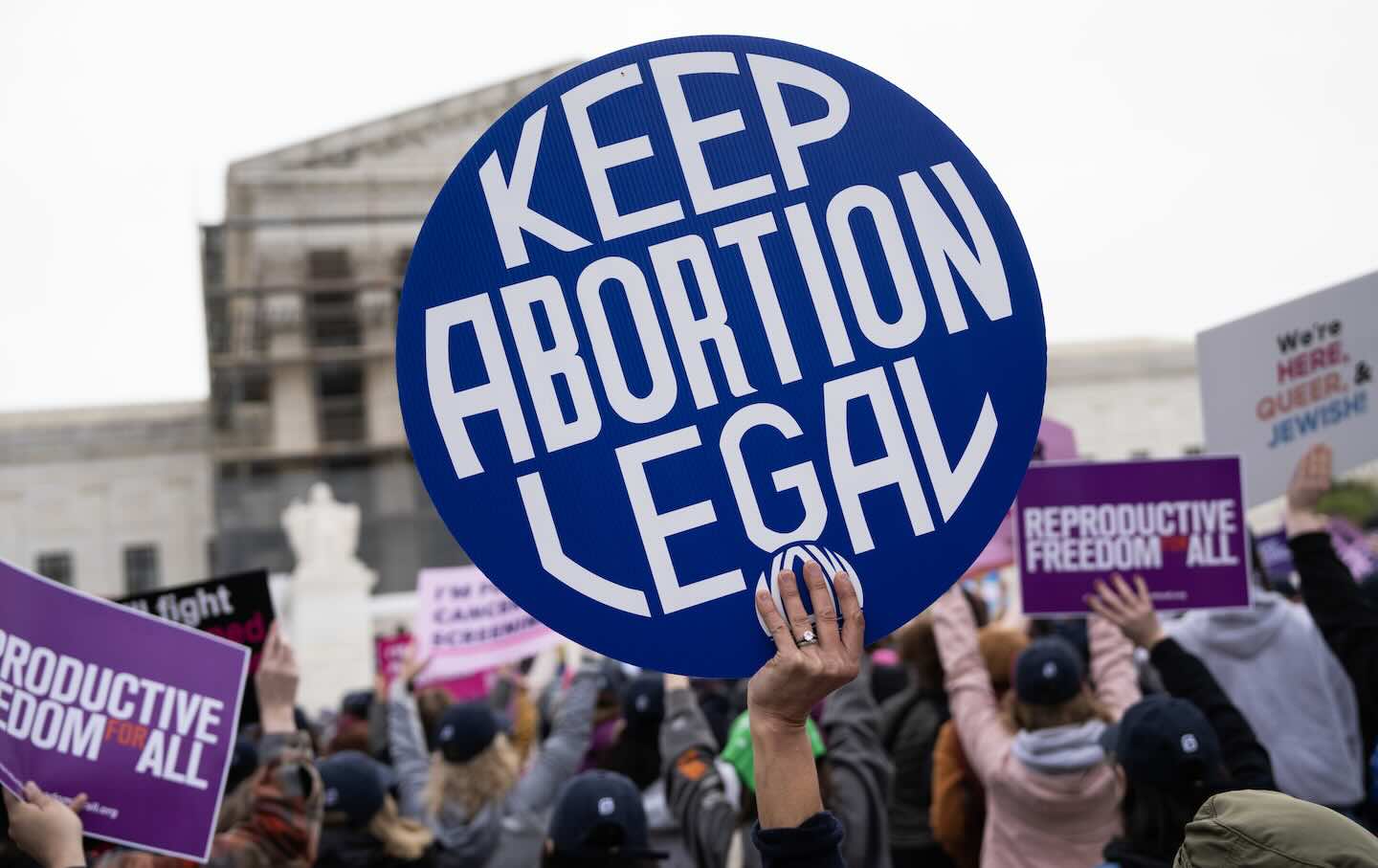 An abortion-rights demonstrator holds a sign in front of the US Supreme Court as the “Medina v. Planned Parenthood South Atlantic” case is heard on April 2, 2025.