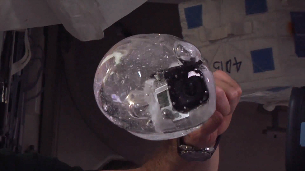ISS Astronauts Slip a GoPro Camera into a Floating Ball of Water in Space