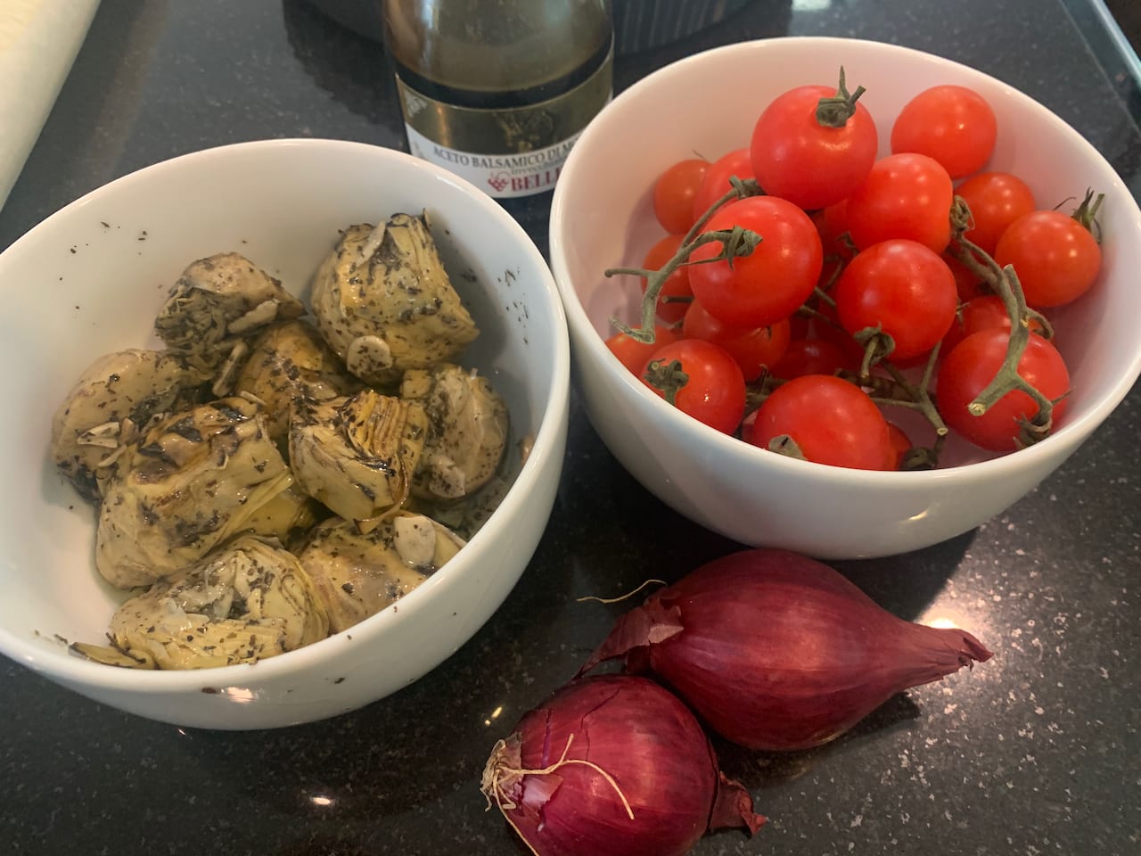 Chargrilled artichoke hearts with tomatoes in a balsamic dressing The